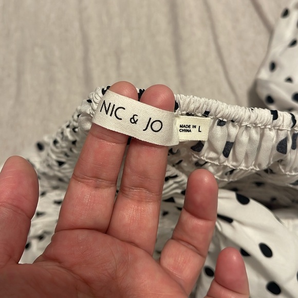 Super cute black and white polkadot romper size large. - Picture 5 of 6